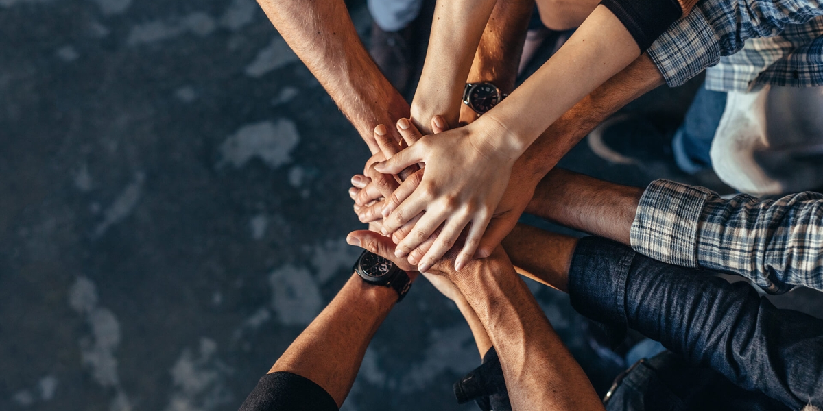 Nonprofit Team Holding Hands