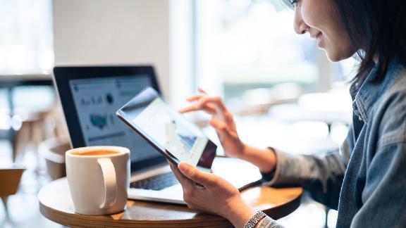 Business report on digital tablet
