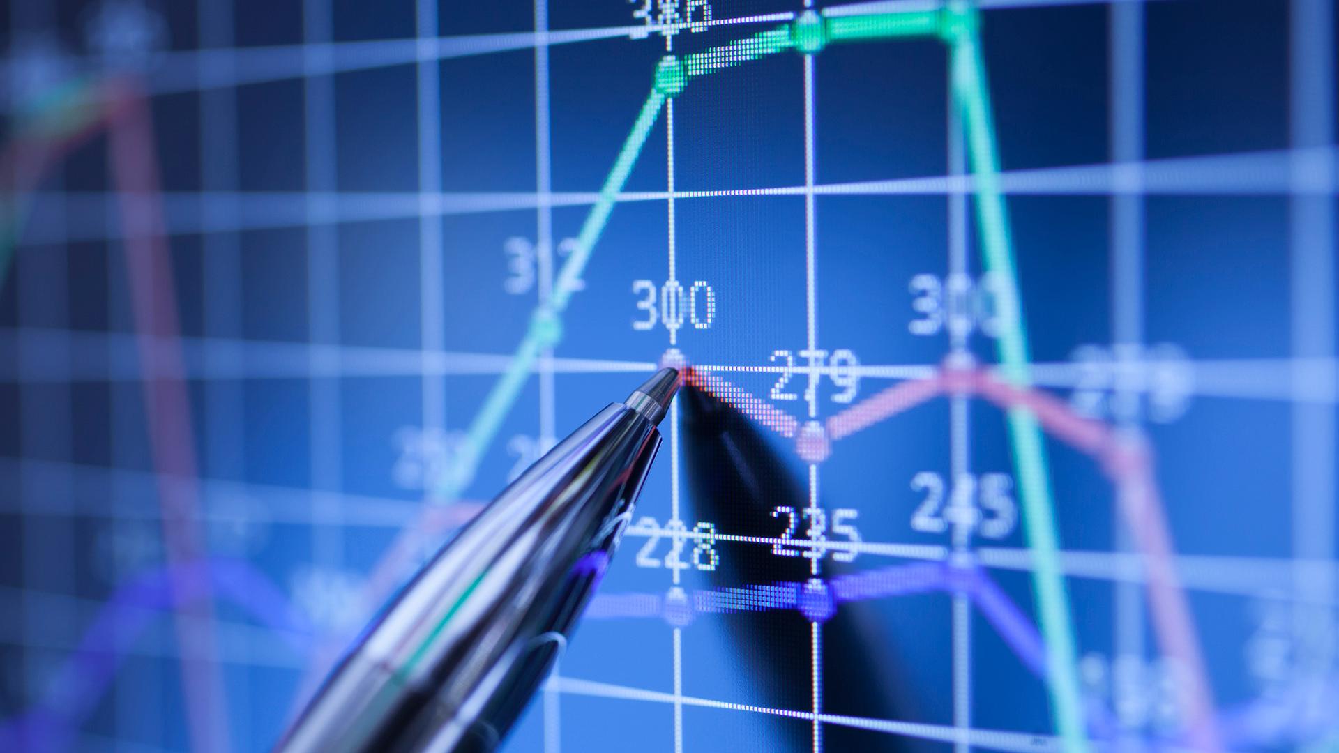 Pen pointing at data on screen